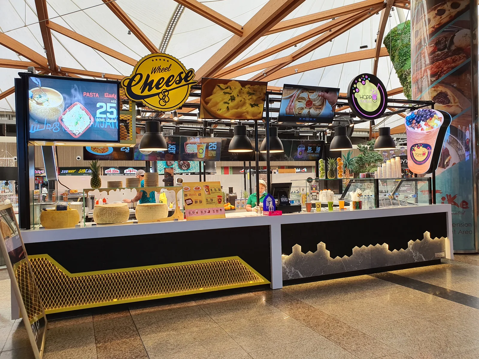 Curved confectionery sweet treat mall kiosk fabrication Dubai